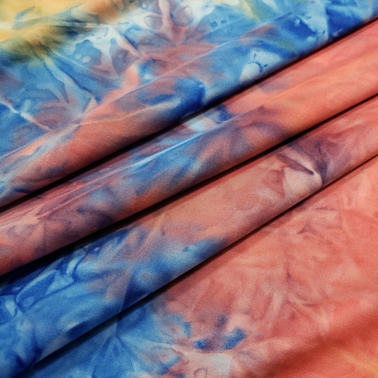 Shades of Orange, Blue, Yellow and Green Fire Tie Dye Print Poly Spandex Fabric