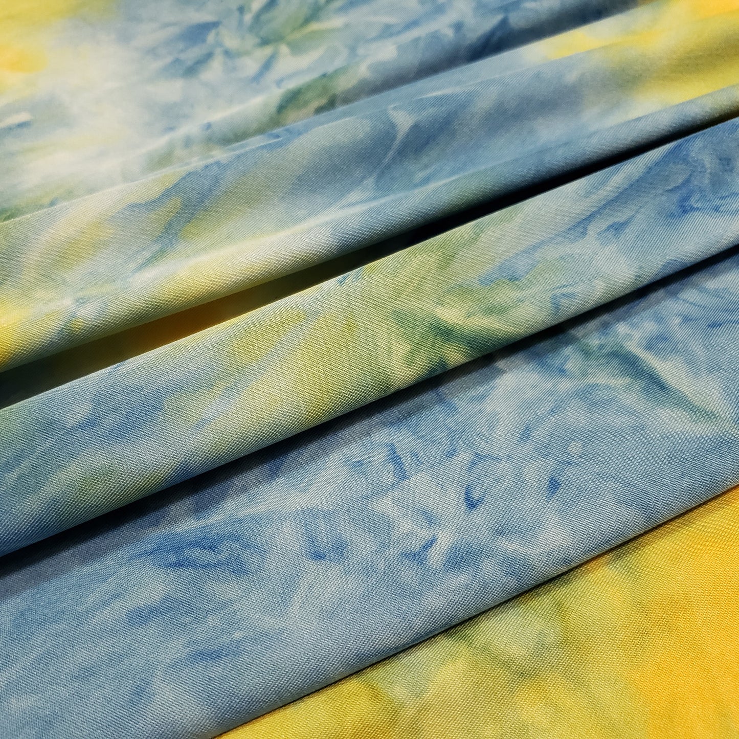 Blue, Yellow and Green Tie Dye Print Lightweight Poly Spandex Fabric