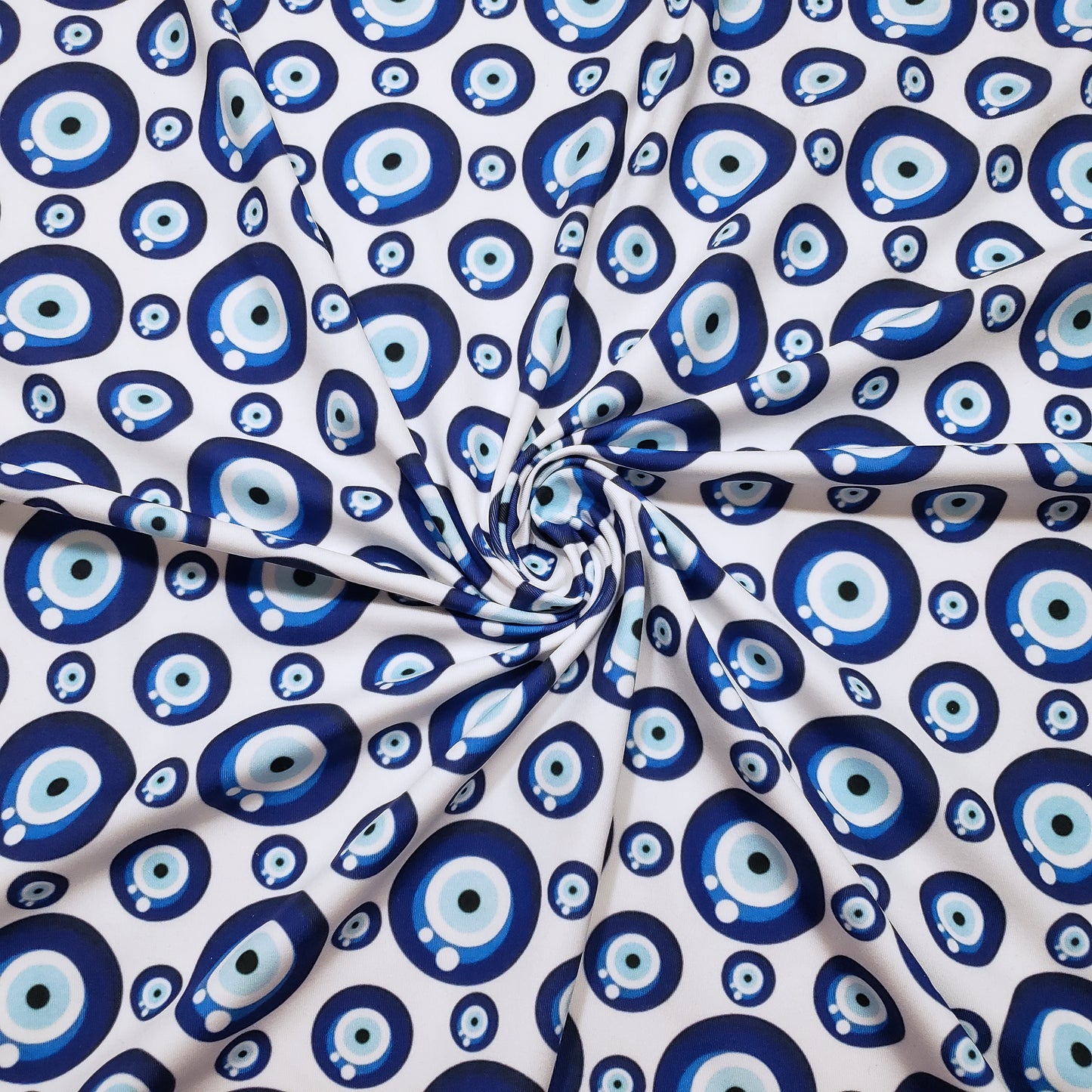 Evil Eye Nazar Print Fabric – Navy, Royal & Light Blue Eyes on White 4-way Stretch Poly Spandex