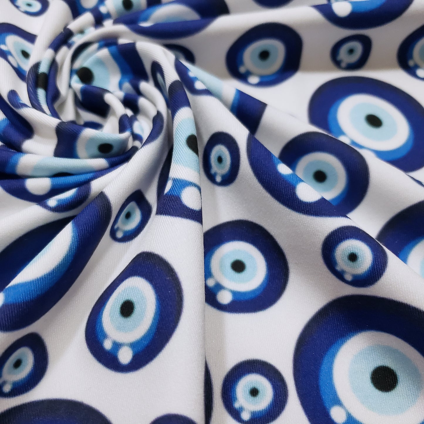 Evil Eye Nazar Print Fabric – Navy, Royal & Light Blue Eyes on White 4-way Stretch Poly Spandex