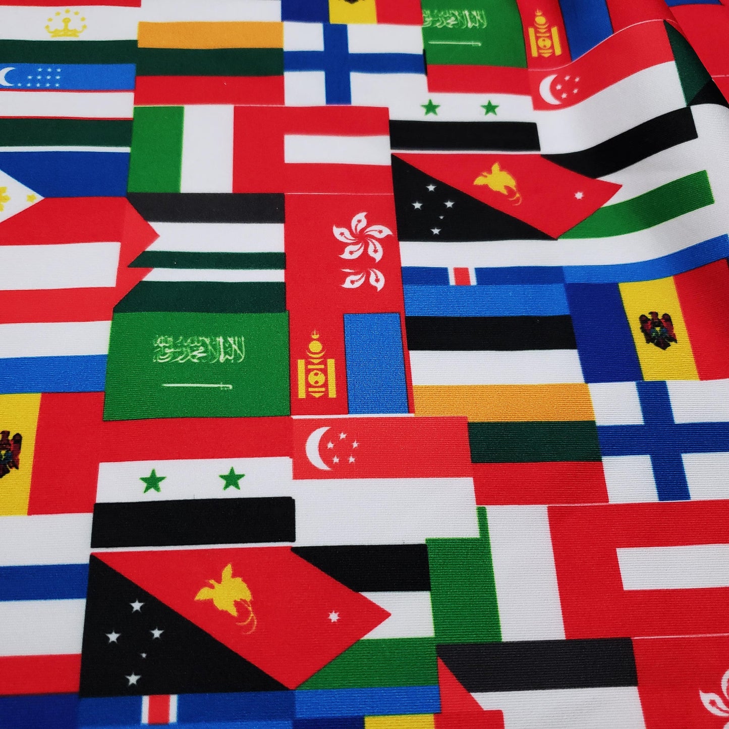 Flags of the World Print – 4-Way Stretch White Nylon Spandex Fabric