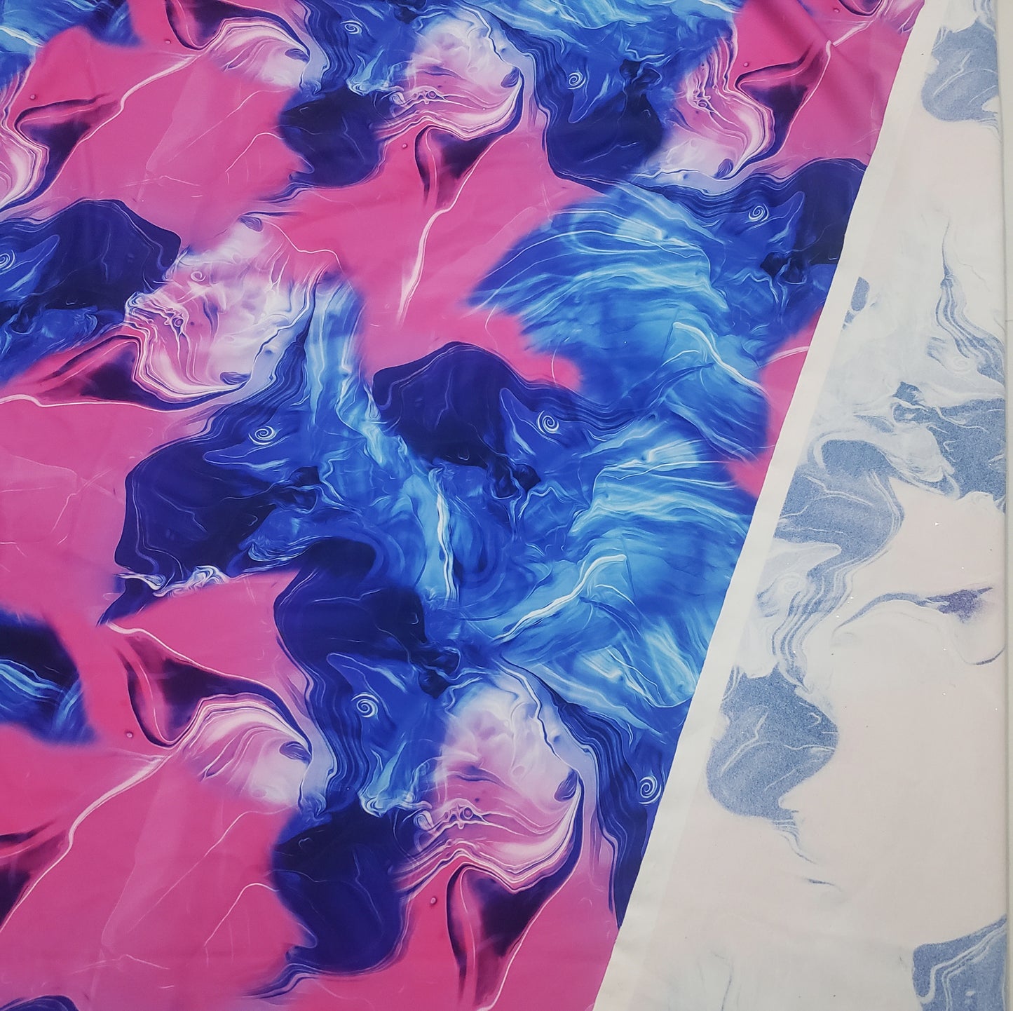Blue and Pink Cotton Candy Oily Print 4-Way Stretch Nylon Spandex Fabric