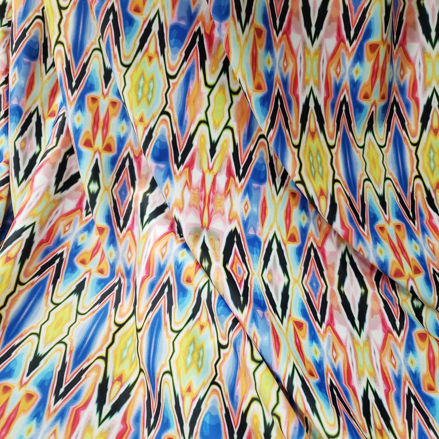 Psychedelic Stained Glass Ikat Print 4-Way Stretch Nylon Spandex Fabric
