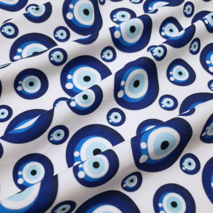 Evil Eye Nazar Print Fabric – Navy, Royal & Light Blue Eyes on White 4-way Stretch Poly Spandex