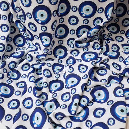 Evil Eye Nazar Print Fabric – Navy, Royal & Light Blue Eyes on White 4-way Stretch Poly Spandex